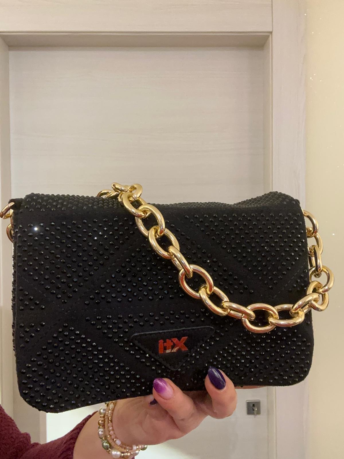 BORSA XTI COMPATTA NERA CON STRASS E CATENA ORO