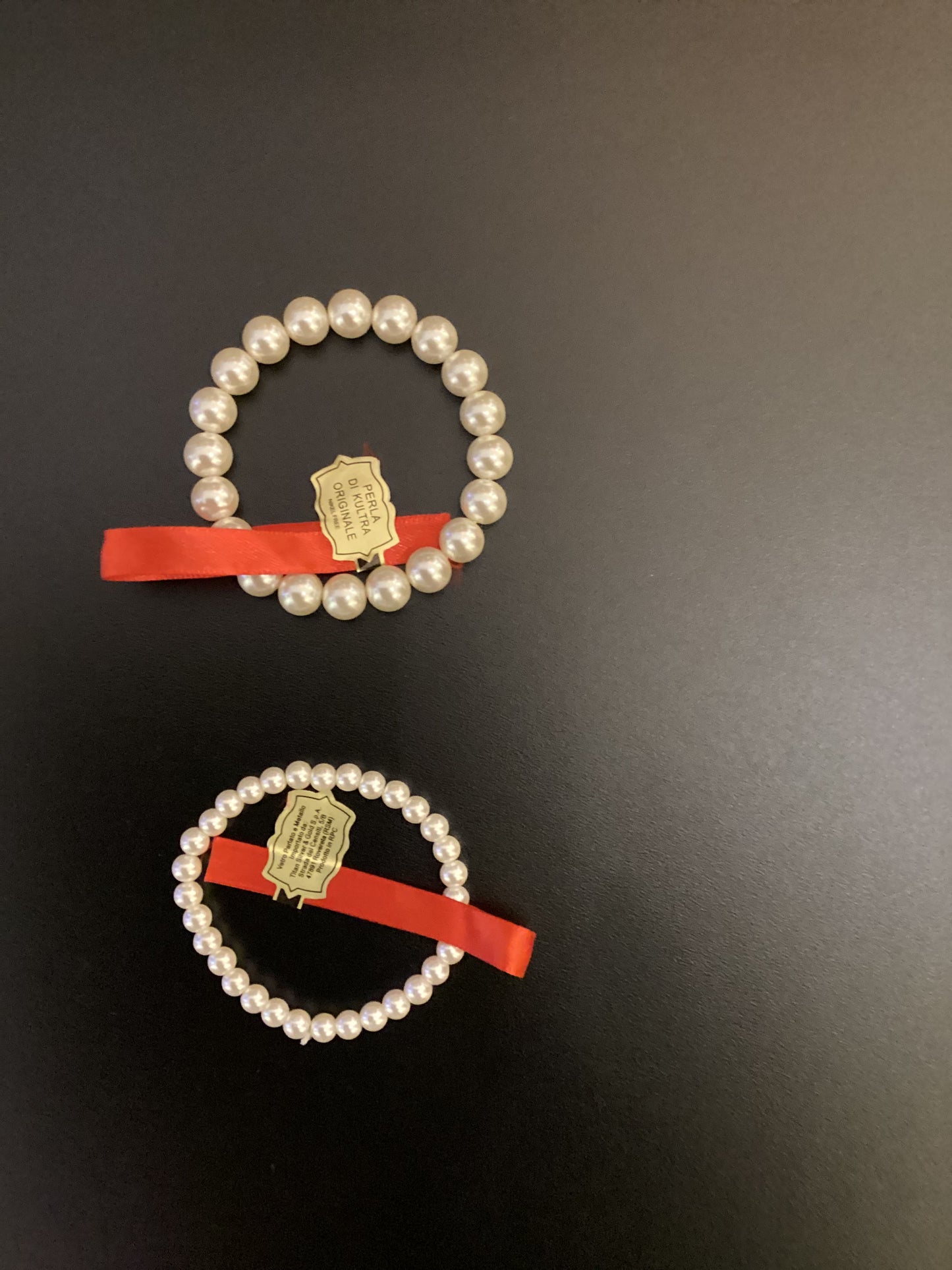 BRACCIALE A MOLLA IN PERLE