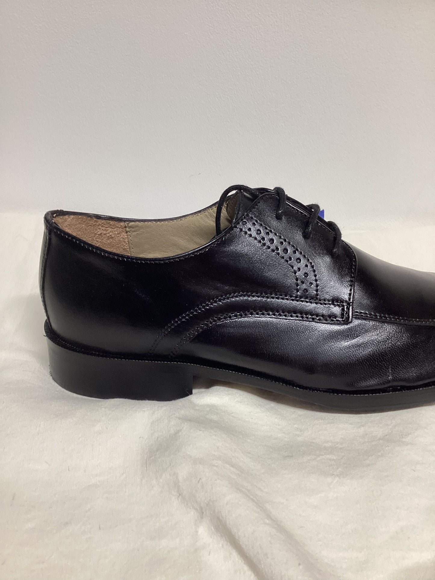 STRINGATA NERA CLASSICA IN PELLE