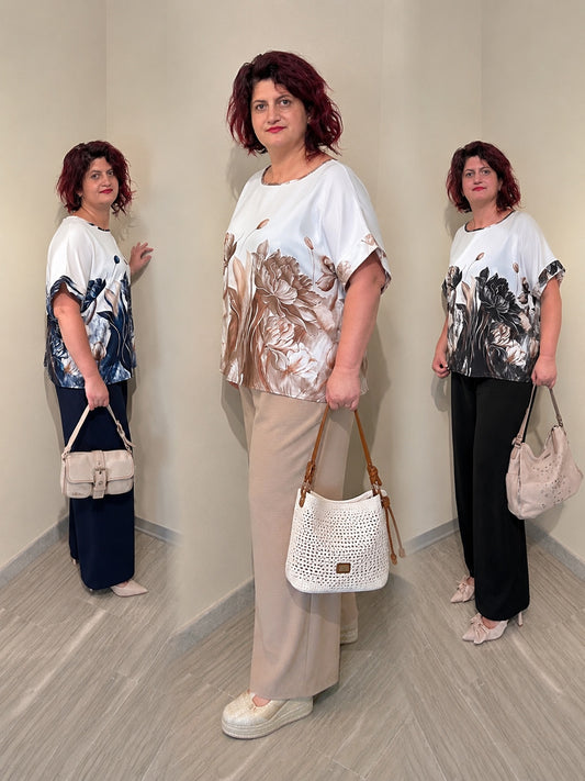 Completo donna elegante con blusa floreale e pantalone palazzo
