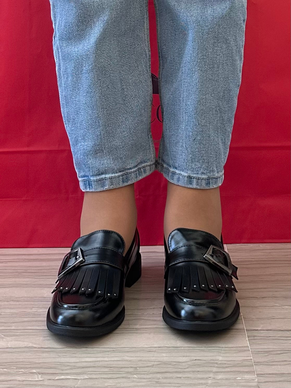 Marina Torres mocassino donna nero con fibbia e frange