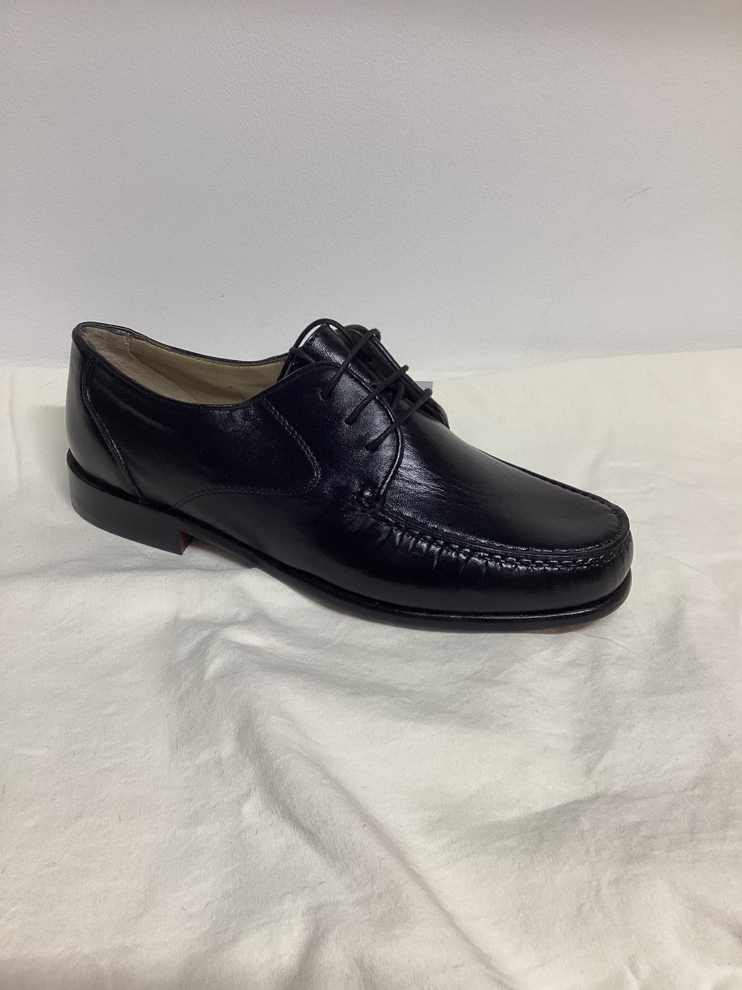 MOCASSINO STRINGATO NERO IN PELLE